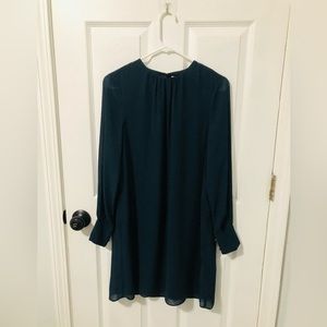 H&M Size 4 Color Dark Blue long sleeve Top 100% Polyester.